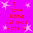 A static image with a bright pink background featuring repeated text and star shapes in red and white.