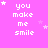 Pixelated text 'you make me smile' in white on bright pink background with scattered star shapes, arranged in a pattern