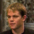 Static 50x50 pixel buddy icon showing a close-up of a person's head and shoulders with light brown hair against a dark background.