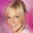 A 48x48 pixel animated contact sheet showing seven sequential frames of a blonde woman with light blue eyes, small dark beauty mark on left cheek, and white top against pink geometric background, arranged in a 3x3 grid with one empty cell.