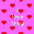 Pixelated pink background with red heart shapes and white text reading "i love troy" in multiple positions.