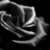 Monochrome abstract icon with interlocking curved and angular shapes on a black background, rendered in grayscale pixels.
