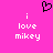 Pixelated pink background with black heart symbol above white text reading "i love mikey" in two identical vertical
