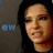 A pixelated image of a person with dark hair and a neutral expression, alongside a white background with two black and white circular symbols and a blue 'CW' logo.