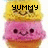 Pixelated ice cream cone with pink scoop, brown waffle cone, and yellow topping; black text 'YUMMY' above the top layer.