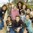 Pixelated group photo of people on left, bright cyan background with pixelated text on right.