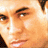 Four 48x48 pixel frames of an animated contact sheet showing a man's face and upper body in different poses, lighting, and color treatments across four quadrants.