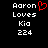 Pixelated text reads 'Aaron Loves Kia 224' with a red heart symbol replacing the 'o' in 'Aaron' on the left side of the image.