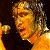 A 50x50 pixel animated contact sheet showing two frames of a Nine Inch Nails-themed buddy icon with a green text logo on the right and a person's face on the left.