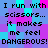 Pixelated text repeats 'I run with scissors... it makes me feel DANGEROUS! DANGEROUS!' across a of cyan, purple, and magenta squares