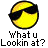 A pixelated yellow circular icon with black sunglasses and a gray background, accompanied by text reading "What u Lookin at?" on the left and "Instant Icons .com" on the right.
