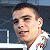 A pixelated image split into two sections: a person in a white shirt with floral patterns on the left, and green text reading 'Original Icons .com' on a dark background to the right.