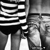 Black-and-white image of two people from the back, one in striped shirt and shorts, the other in jeans, with text "LOVE" below.