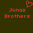 Pixelated orange text 'Jonas Brothers' with a heart symbol above the left text block on a dark green background.