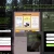 Pixelated static image shows a central rectangular frame with light brown border containing three vertical panels, each with white and yellow gradients; dark gray shape in middle panel.