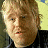 A 48x48 pixel buddy icon featuring a split composition with a person on the left and red text "Along Came Polly" on the right, displayed as part of an animated contact sheet.