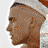 A 48x48 pixel animated contact sheet showing three frames of a character wearing a Santa hat in different poses and angles against a gray background.