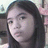 Purple background with pixelated text and a small grayscale photo of a person on the left side.