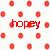 A pixelated static image with a light pastel background featuring scattered red circular shapes and the word 'toppy' in bold red letters.