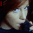 six pixelated images showing a person with brown hair and blue eyes, each displaying different red text overlays
