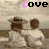 A 4-frame animated contact sheet showing a pixelated couple in white clothing with brown hats, where the word "LOVE" changes color across frames and the woman's arm position shifts between left and right.