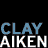 A contact sheet of 11 animated frames showing a pixelated Clay Aiken character with repeated text overlays, arranged in a 4x3 grid on a black background with gray transparency areas.