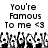 Pixelated black-and-white animation of multiple cartoon figures with raised arms, accompanied by text reading "You're Famous To me <3" in a blocky font.