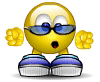Yellow circular face with blue sunglasses, open mouth, and blue-and-white shoes, performing a walking animation with alternating raised feet.