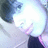 A person with dark hair and light skin appears in a of four , each showing slight variations in head position against a blurred background