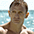 A contact sheet of five animated frames showing a shirtless man with short brown hair against a blue water background, transitioning to a black screen with white text reading 'Casino Royale' in a stylized font.