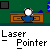 Pixelated character with white head and blue body sits at brown desk under green background, text "Laser Pointer" appears below in gray bar.