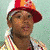 A 3-frame contact sheet of a person wearing a red and white cap with orange accents, striped shirt, and visible necklaces against a light green background.