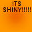 Four identical orange gradient backgrounds each display black pixelated text reading 'ITS SHINY!!!!!' in two lines.