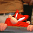 A 4-frame animated contact sheet showing a red cartoon character with white teeth and black eyes in various poses, including leaning over a railing and making expressive gestures against a brown background.