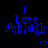 Blue pixelated text "I Love Ashleigh" with a small heart symbol on black background, repeated in