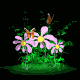 Animated sequence of pink flowers with yellow centers and green foliage, featuring orange butterflies in various flight positions against a black background.