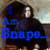 A pixelated image shows a figure in dark clothing with blue text reading "I Am Snape_" overlaid, against a light background.