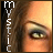A close-up of a person's eye with brown hair, featuring vertical text on the left side.