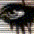 A static 48x48 pixel buddy icon with a heavily pixelated, low-resolution appearance showing indistinct shapes and scattered colored pixels against a black background.