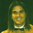 A pixelated image of a person with long hair wearing a bow tie and collared shirt, set against a bright pink background with cyan text.