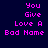 Pixelated text "You Give Love A Bad Name" in pink on dark blue background with green highlight boxes shifting