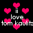 Pixelated pink hearts float over black background with repeated white text 'love tom kaulitz' and two vertical dots.