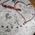 A static icon featuring a heart-shaped outline with red and white elements on a textured background.