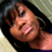 A person with dark hair and bangs appears in four -aligned showing slight variations in head tilt against a light background