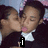 Animated sequence showing two people kissing with changing text overlays and a gray in the bottom-right