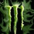 Green and white stylized 'M' logo with dripping effect on dark background, pixelated rendering.