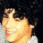 Four distinct pixelated images of a young man with dark tousled hair, each showing different expressions and backgrounds.