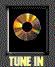 Two side-by-side static images of a circular disc-shaped object with multicolored segments on black backgrounds, each framed by pixelated borders.
