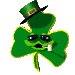Green four-leaf clover with a black top hat and white teeth, displaying multiple facial expressions against a gray background.
