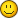Four yellow pixelated smiley faces arranged in a , each with distinct facial features including eyes and mouths